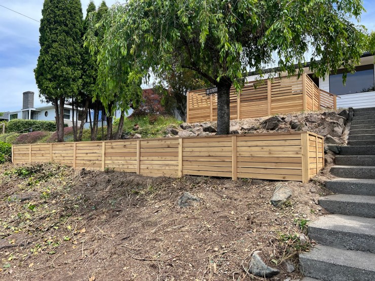 Cedar slat retaining wall and steps built as part of the West Seattle view deck project